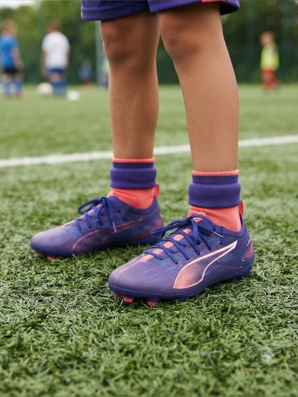 Puma Youth Royal Blue Sneakers with Orange Swoosh Accent